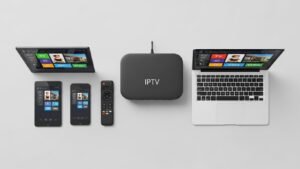 An arrangement of a TV remote, IPTV box, smartphone, tablet, and laptop, all displaying an IPTV interface, showcasing the ability to watch on any device.